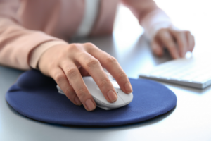 Woman's hand on a computer mouse